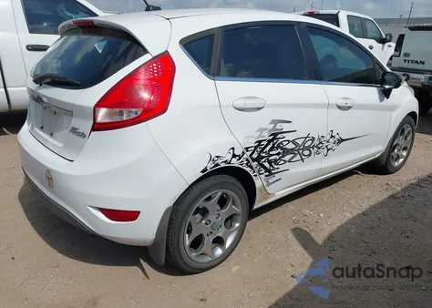 2011 Ford Fiesta Ses z USA, uszkodzony, nr VIN 3FADP4FJXBM106806
